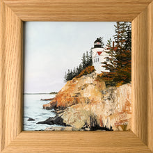 Load image into Gallery viewer, Warm golden light washes over the pines and rugged shoreline, capturing the calm beauty of Maine’s coast. This original oil painting evokes a peaceful, glowing moment by the sea, perfect for bringing a touch of coastal serenity to any space.
