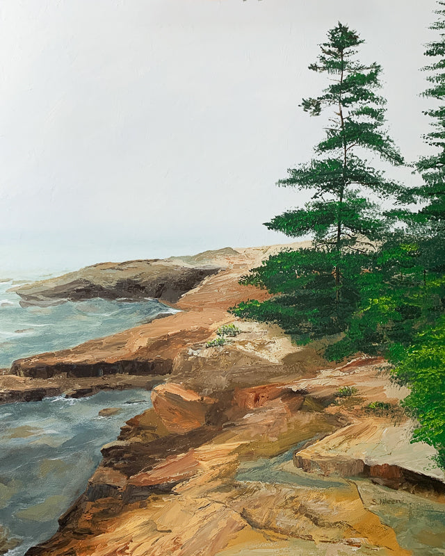 Outpost II is an original oil painting that captures the resilience of Acadia’s rugged coast, where two windswept pines stand atop weathered rock beneath a hazy, diffused sky. The translucent water reveals glimpses of stone beneath the surface. 