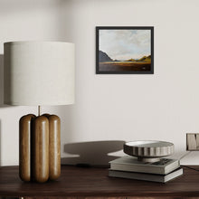 Load image into Gallery viewer, Mockup of framed oil landscape with distant mountain peaks, calm lake in the foreground, overcast sky, and earthy tones.
