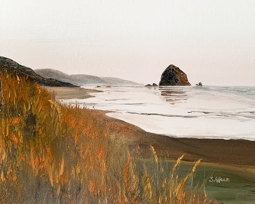 Oil painting of Cannon Beach at sunset, featuring soft pastel skies, silhouetted sea stacks, and gentle waves reflecting warm hues.
