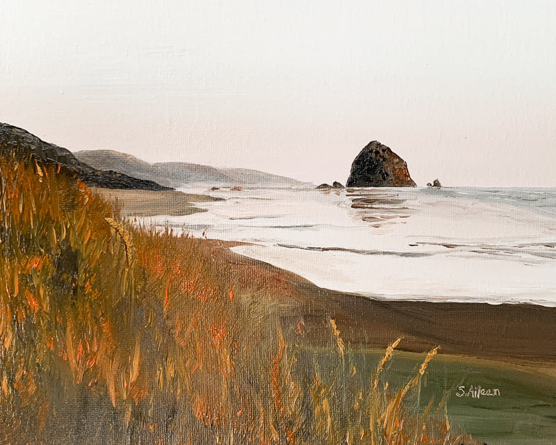 Oil painting of Cannon Beach at sunset, featuring soft pastel skies, silhouetted sea stacks, and gentle waves reflecting warm hues.
