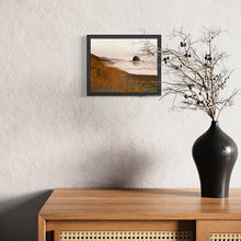Load image into Gallery viewer, Mockup of framed oil painting of Cannon Beach at sunset, featuring soft pastel skies, silhouetted sea stacks, and gentle waves reflecting warm hues.

