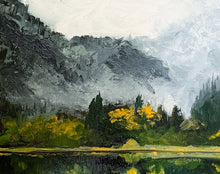 Load image into Gallery viewer, Oil painting of a calm lake bordered by tall pine trees and a rocky shoreline, with soft fog draping distant hills. Gentle light suggests early morning, evoking a quiet sense of awakening in nature.
